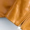 Veste de motard en cuir verni