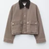 Veste en denim à col en velours côtelé