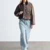 Veste en denim à col en velours côtelé