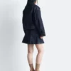 Veste en denim à col en velours côtelé