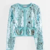 Veste en maille ornée de paillettes