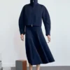 Veste à manches sculpturales