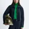 Veste à manches sculpturales
